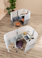 Image of a Steelcase Brody desk and a Brody Work Lounge with acrylic surrounds